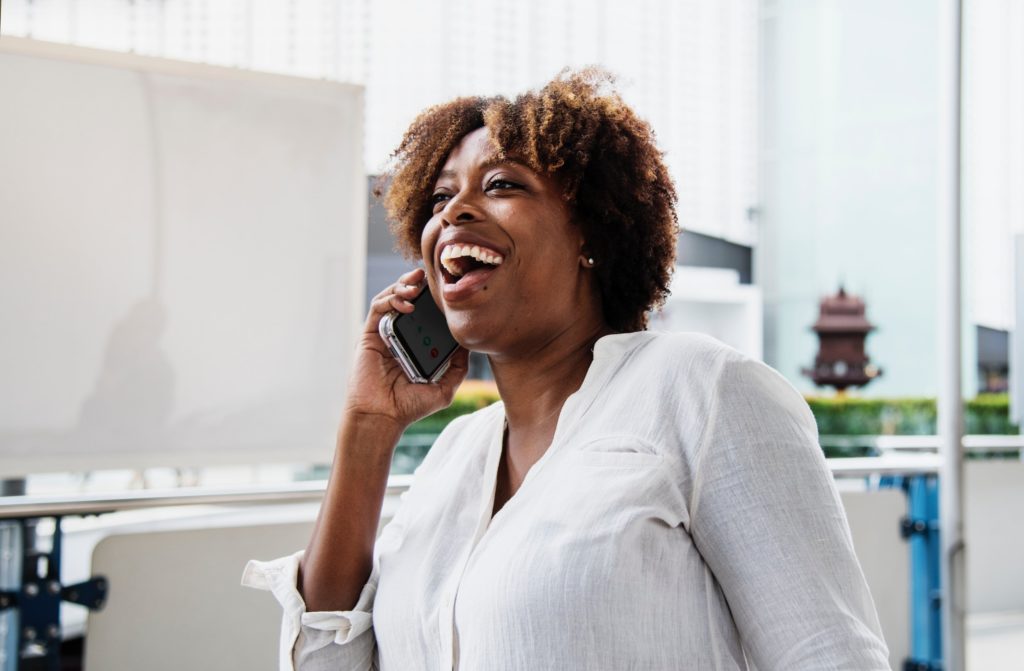 Happy donor on the phone.